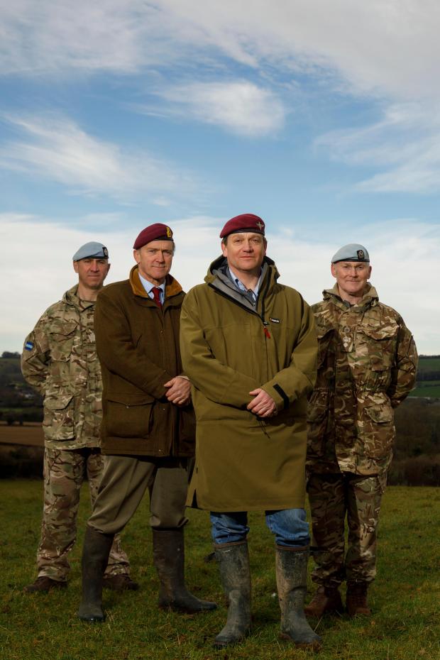 Hampshire Chronicle: Servicemen and veterans of the Air Corps and the Parachute Regiment, (L-R) WO1 Paul Dockrell AAC, Major General Jonathan Shaw CB, CBE PARA (retd.), Major Will Pike PARA (retd.) and Lieutenant Colonel Ewen Stuart AAC pose at the proposed site of a